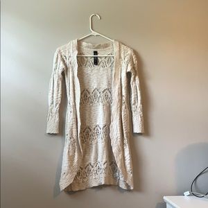cream cardigan with designs